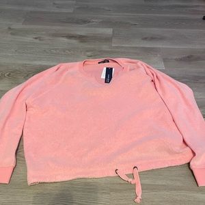 pink v neck sweater